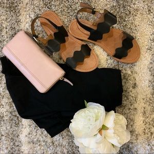 Women’s black scalloped sandals